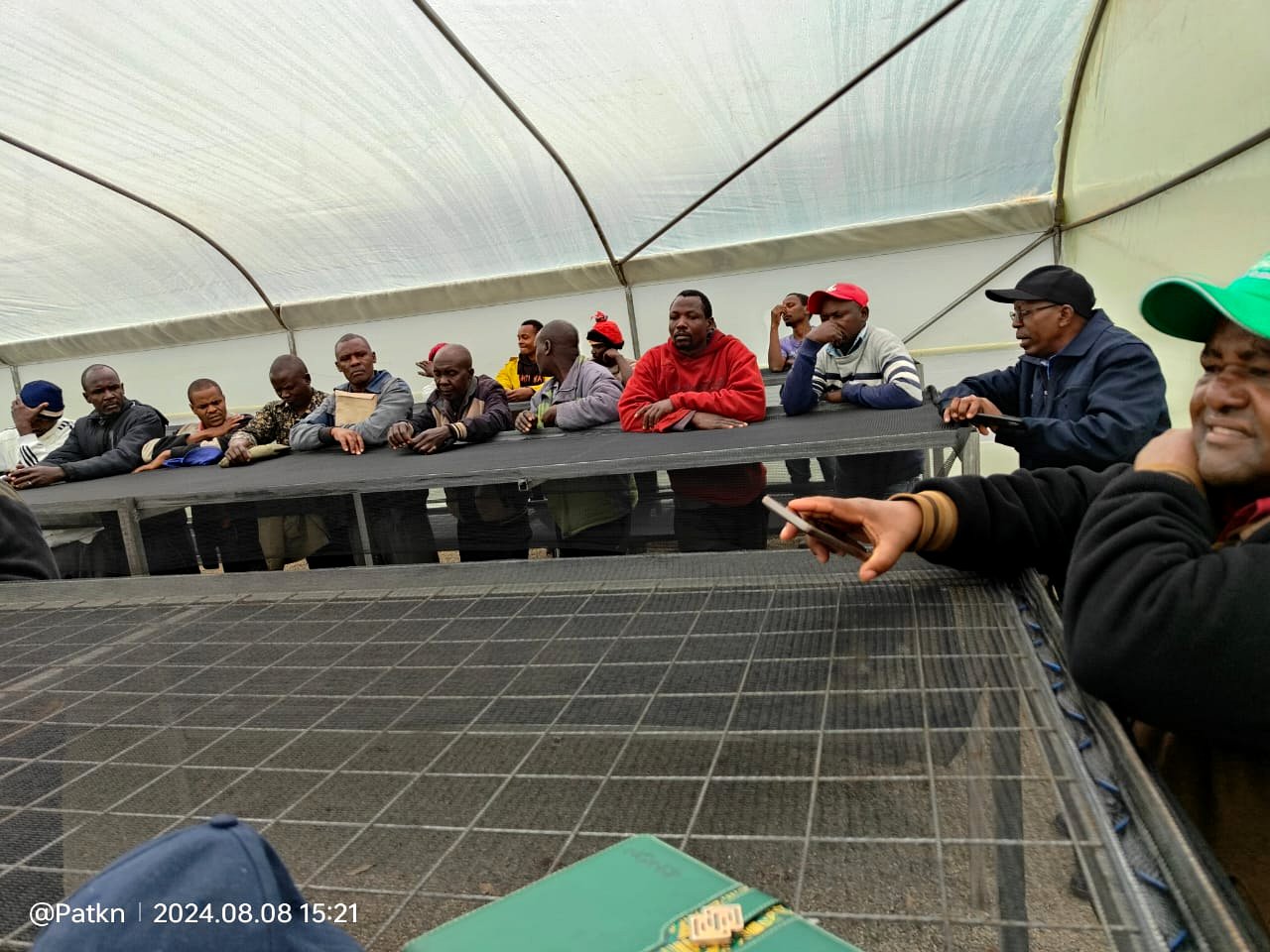 Farmers attending an indoor training session